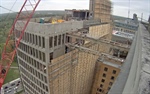 Crane will lower Queeny Tower skybridge this week