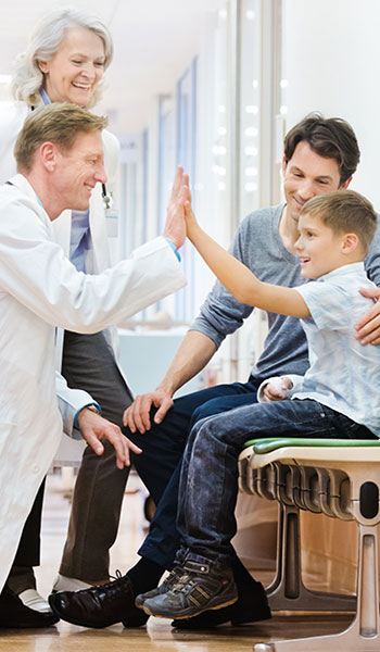 Patient and caregiver high-fiving