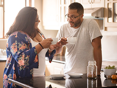 Two people drinking coffee