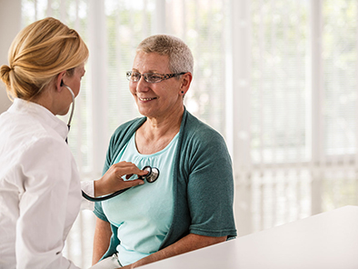 Doctor examining a patient with a stethoscope