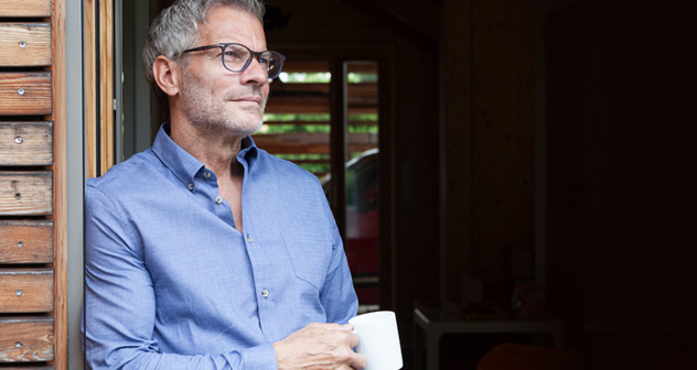 Man drinking a cup of coffee