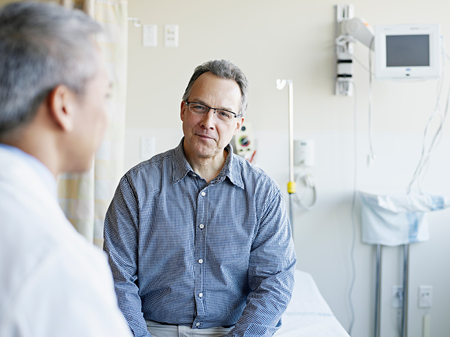 Man talking to a doctor