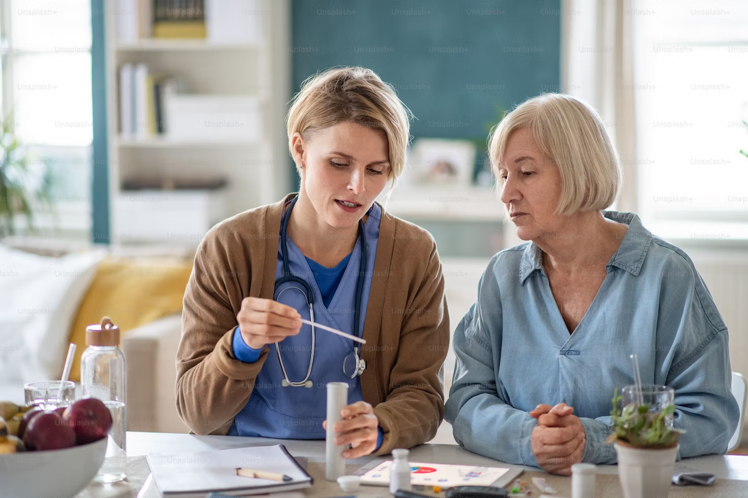 doctor and patient sitting at table