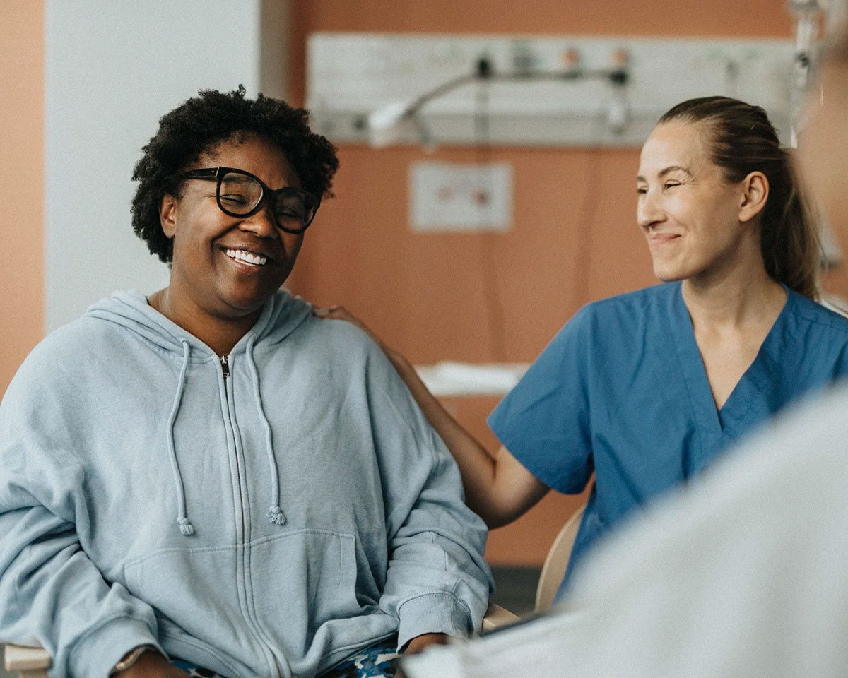 Two women smiling