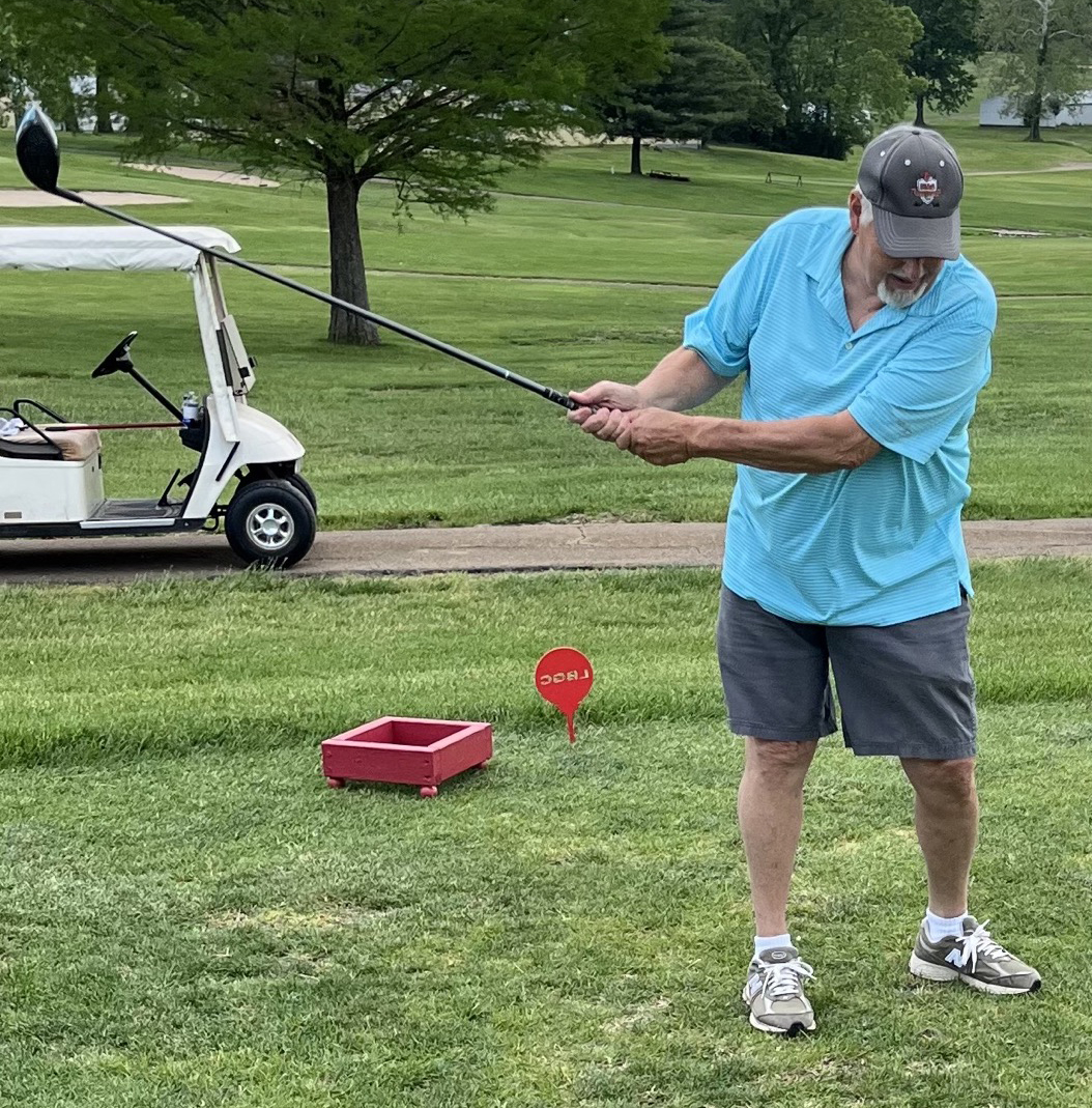Bill Bunch playing golf post surgery