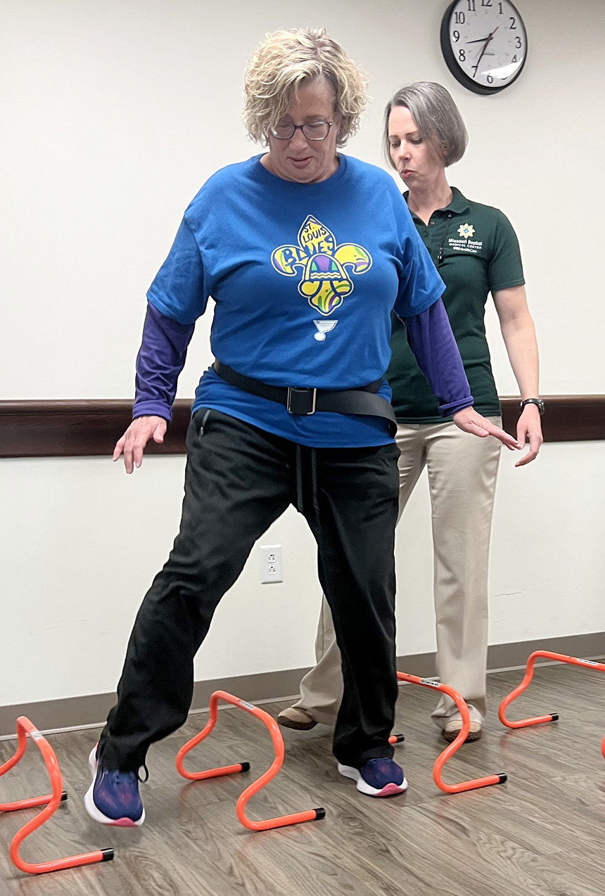 Patient LeAnn Areford participating in physical therapy after her surgery.