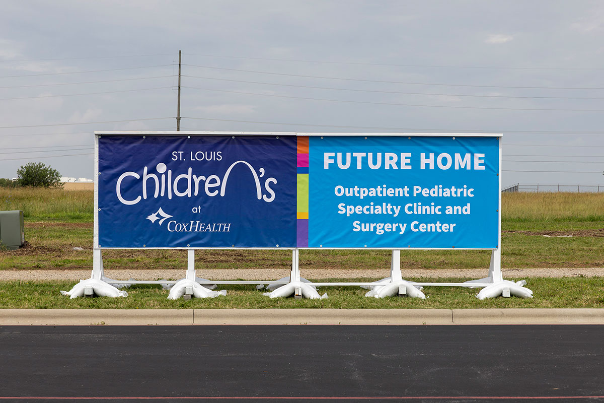 banner near the street featuring st lous children's future home