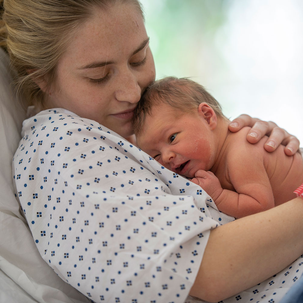Mother holding a newborn baby