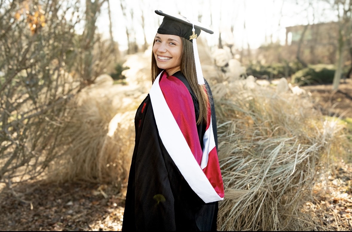 Ashley Gennero in a cap and gown for her graduation photo