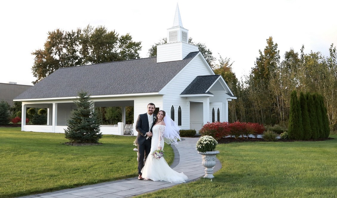 Ashley Gennero with her husband outside the church on their wedding day