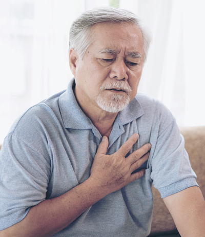 Man holding his chest with his hand