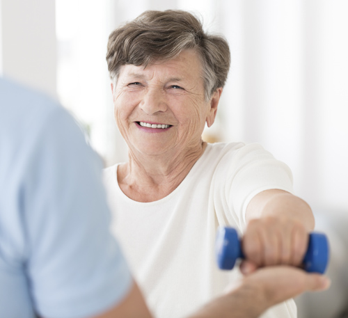 Woman lifting a weight dumbbell