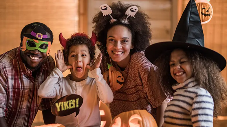 People wearing Halloween costumes
