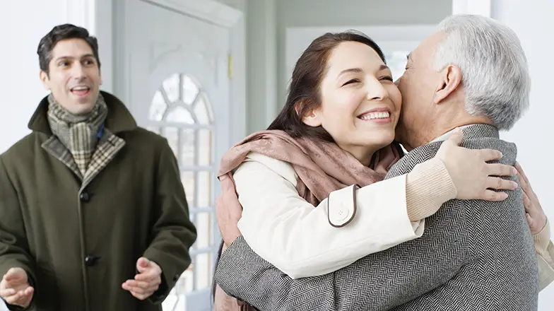 Woman hugging a man