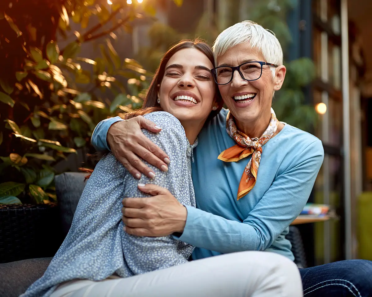 Two women hugging