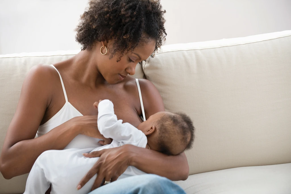 Mother breastfeeding baby