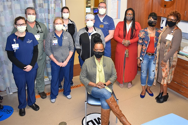 Chenitra Crimes-Washington pictured with caregivers at Northwest HealthCare Emergency Department