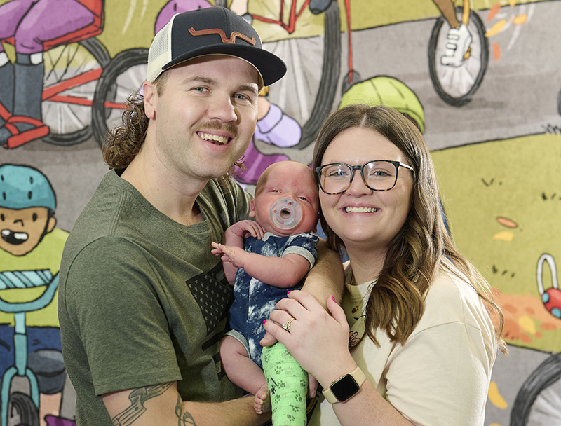 Paige and Cody with newborn