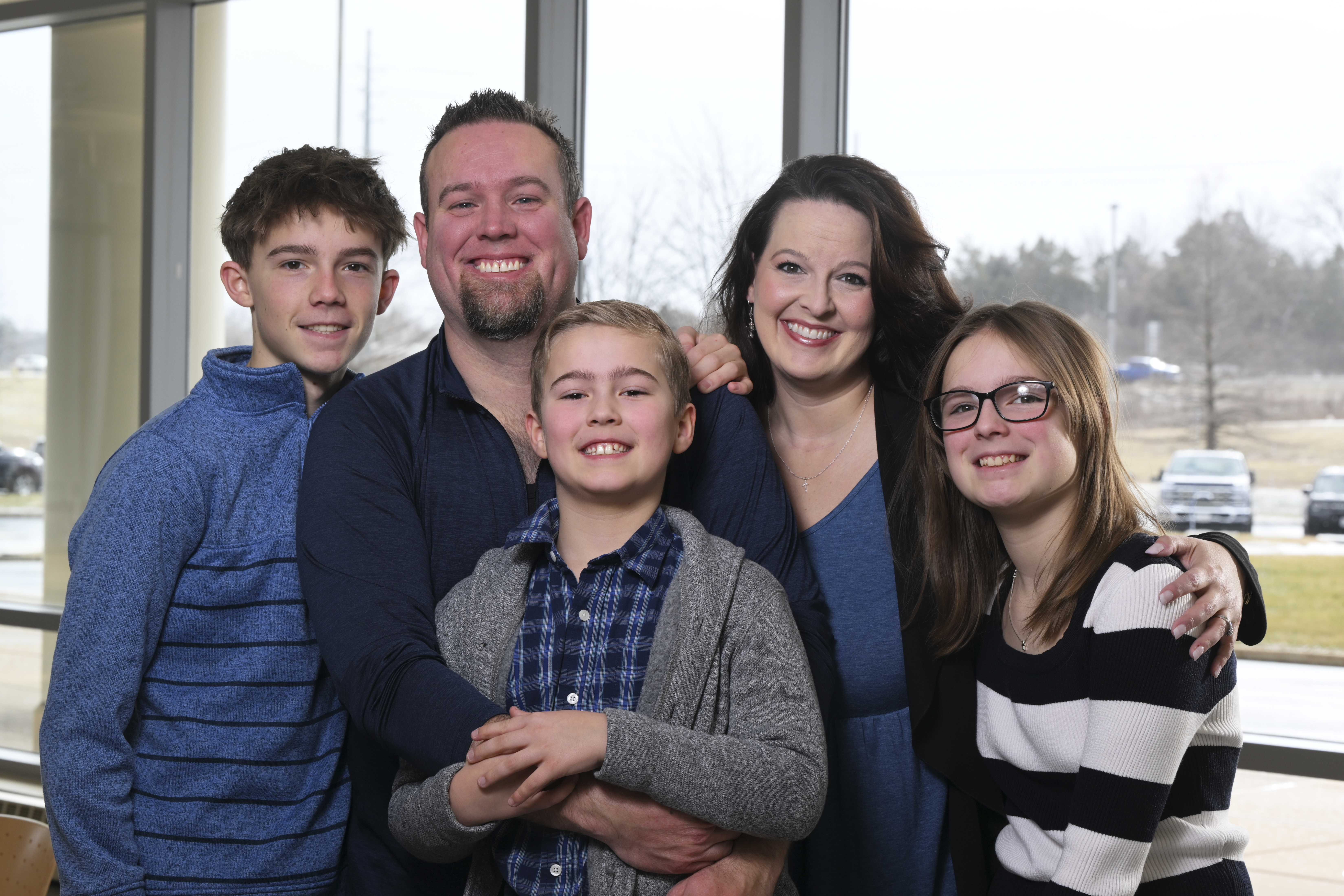  Greg Sadler with his wife, Valerie (right), and children Cole (right), Clark (middle), and Heidi (far right
