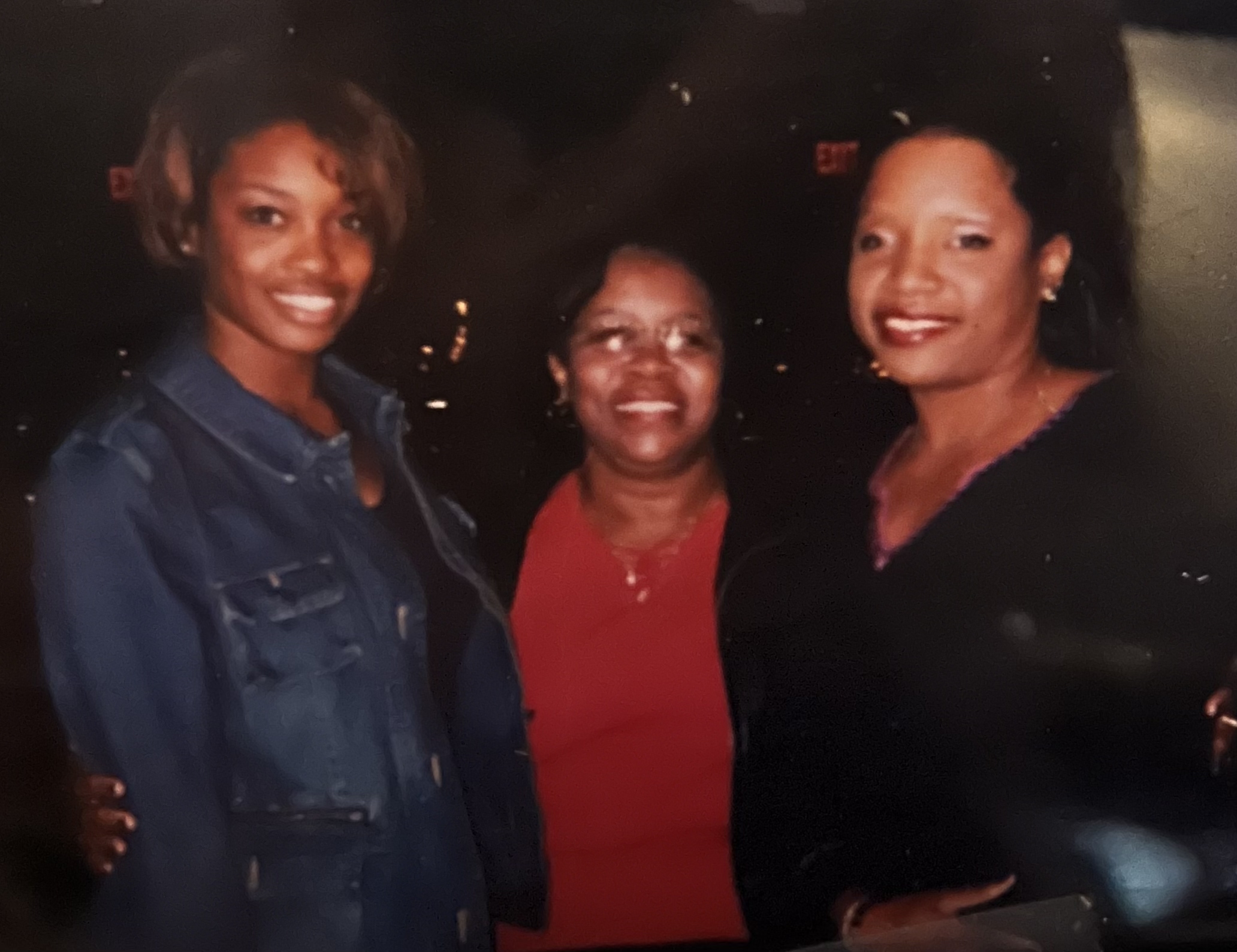 Mary Howard (center) with her daughters Melanie (left) and Sandra (right). 