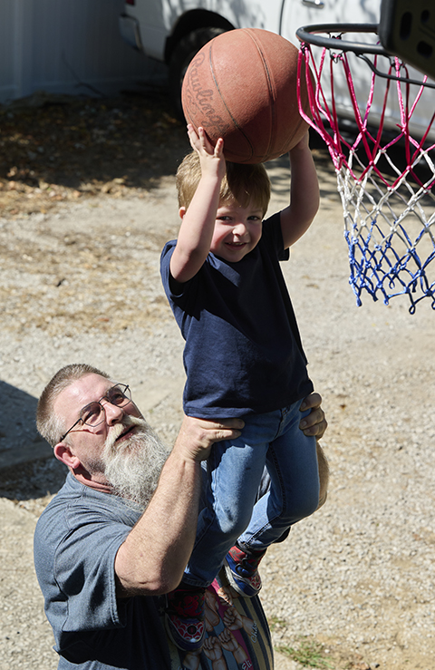 After successful spine surgery William is enjoying playing with his grandkids.