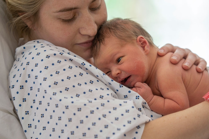 Mother holding a newborn baby